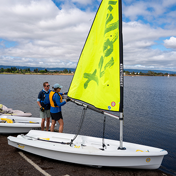 Someone receiving instructions for sailing