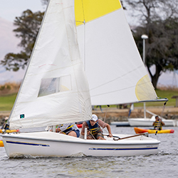 A man and woman in a sailboat